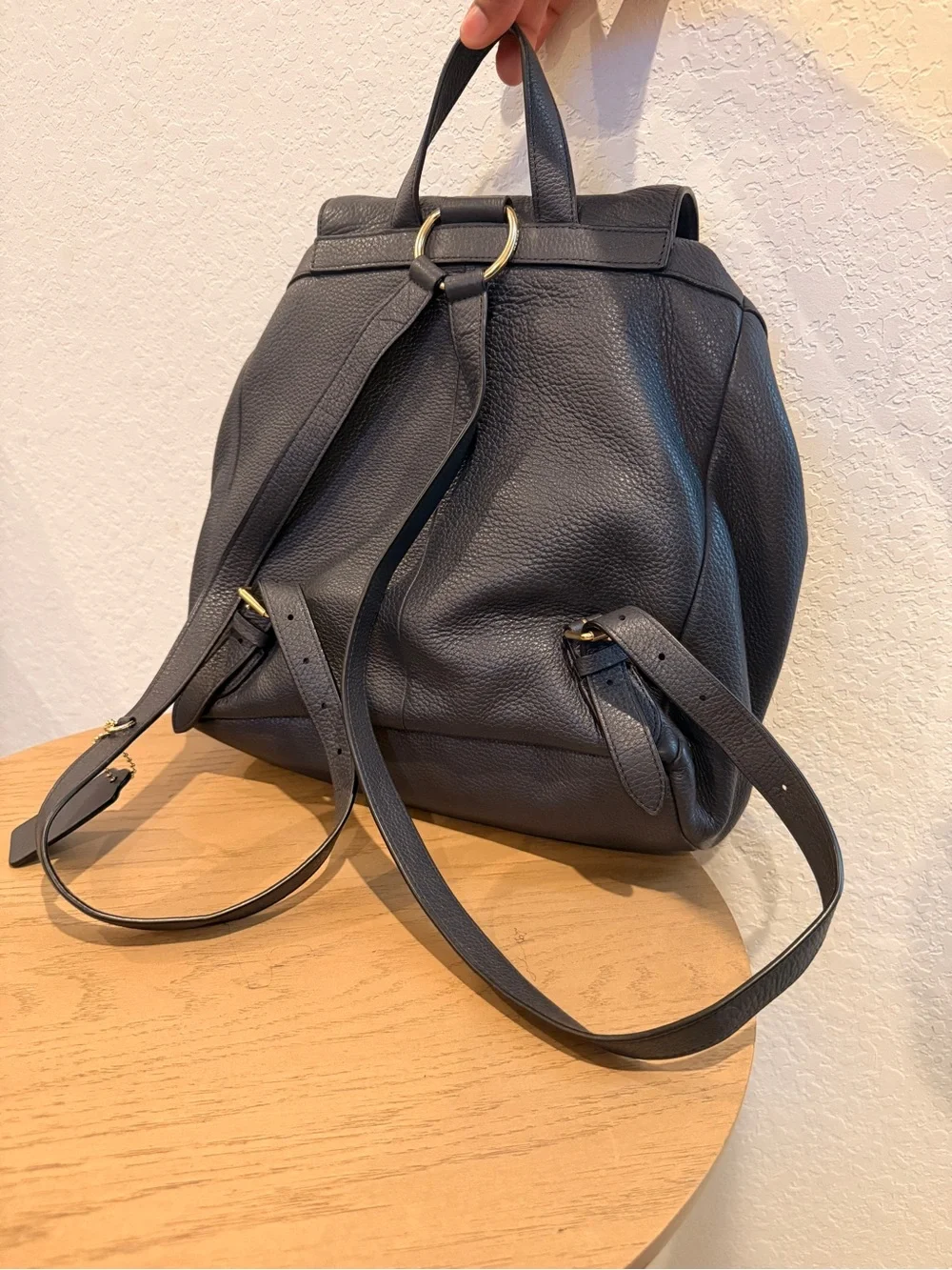 COACH Black Pebbled Leather Drawstring Backpack with Front Pockets